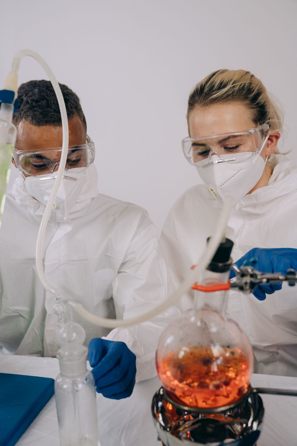 Engineers performing chemical testing in a laboratory