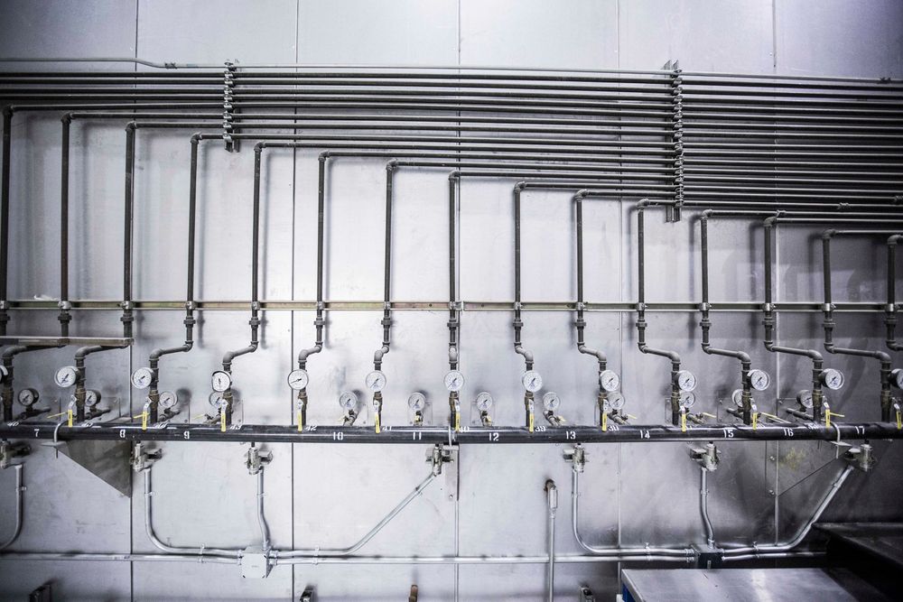 Stainless process piping and pressure gauges